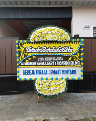 Papan Bunga Duka di Bualo